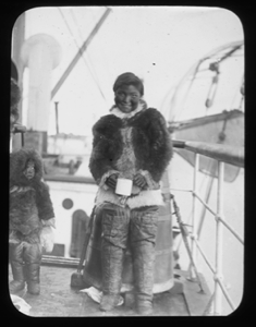 Image of Inuit mother and child aboard